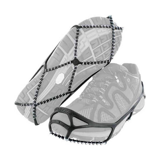Pair of black rubber shoe traction cleats with metal coil spikes, shown overlapping on a white background