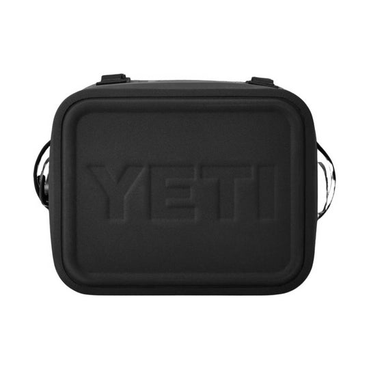 Black rectangular soft cooler with a zipper closure and side carry handles, shown front view